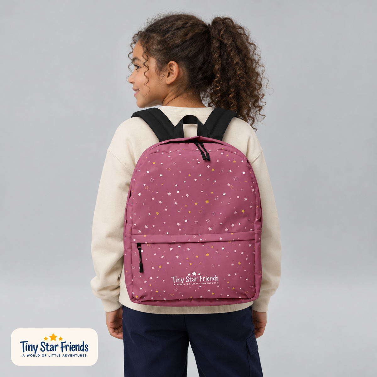 School-age child wearing the Berry Rose Signature Stars backpack | Tiny Star Friends™
